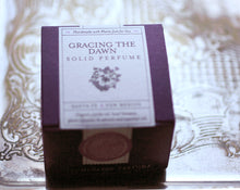 Load image into Gallery viewer, Gracing the Dawn Solid Natural Perfume in Round Jar

