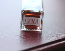 Load image into Gallery viewer, Lyra Botanical Perfume 4 gram rectangular bottle
