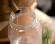 Load image into Gallery viewer, Pinon Hydrosol/Hydrolat, in 50ml dark violet glass bottle

