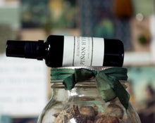 Load image into Gallery viewer, Pinon Hydrosol/Hydrolat, in 50ml dark violet glass bottle

