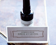 Load image into Gallery viewer, Pinon Hydrosol/Hydrolat, in 50ml dark violet glass bottle
